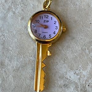 Zip Keychain watch battery gold tone
